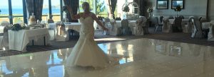Bride Dancing on one of our 20ft x 20ft White LED Dance Floors